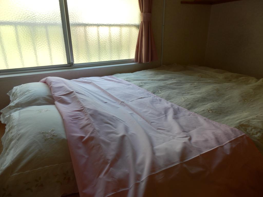 Izumi Hotel Изу Екстериор снимка
